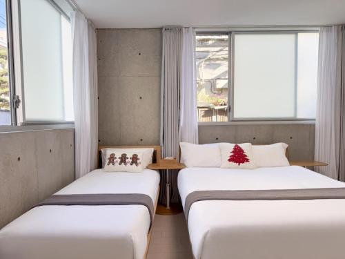 Higashinippori Apartment | 102Room,7-minute walk from Uguisudani Station located on the 1nd floor of an apartment-style building Twin room No elevator