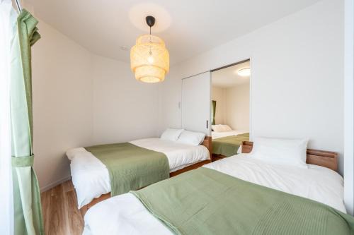 Ikuno Villa | 3 Free Rental Bicycles - Free Parking - 85sqm - Up to 9 Guests - 7min to Koreatown - Japanese Lessons by Professional teacher - 自転車3台無料貸出 - 無料駐車場 - 85平米 - 定員9名 - コリアタウン徒歩7分 - Mintak Katsuyama V Residence