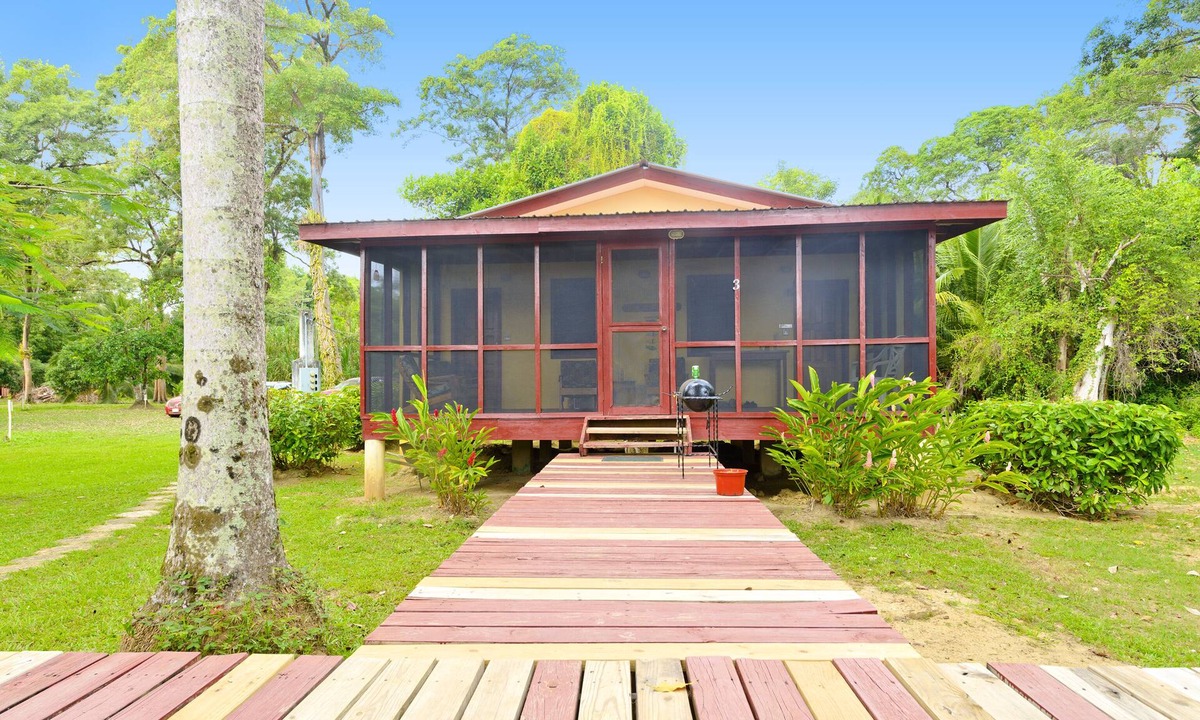 Hopkins Cabin | Beautiful cabin nestled in tropical surroundings on the Banks of the Sitee River