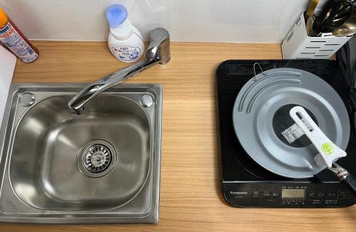 Kabukicho Apartment | ゴジラヘッドまで徒歩9分 最寄り駅まで4分 ダブルベッド数台ファミリー向け部屋