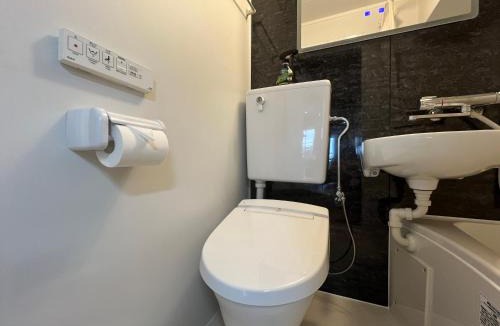 Kabukicho Apartment | ゴジラヘッドまで徒歩9分 最寄り駅まで4分 ダブルベッド数台ファミリー向け部屋