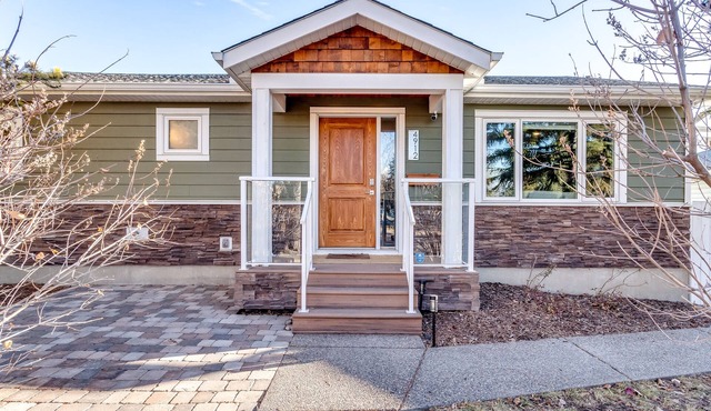 4-bedroom detached home with recreation room and hot tub! in Calgary
