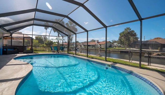Crystal River Pool Home ~ Waterfront w/Boat Dock, Hot Tub & fenced backyard. in Crystal River