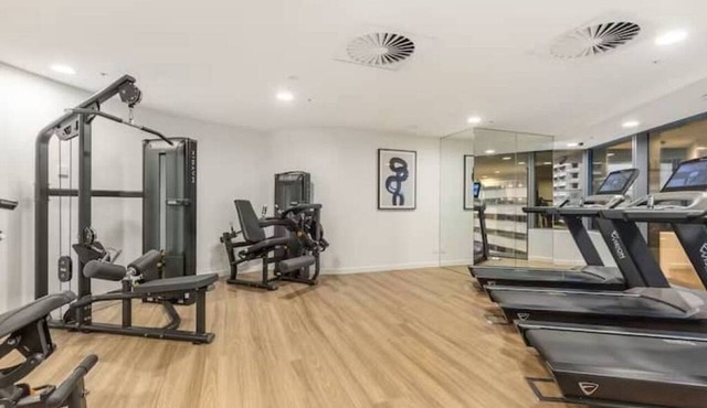 Level 25 River Views at Queen's Wharf | King Bed + Balcony | Heated Pool & Sauna in Brisbane City