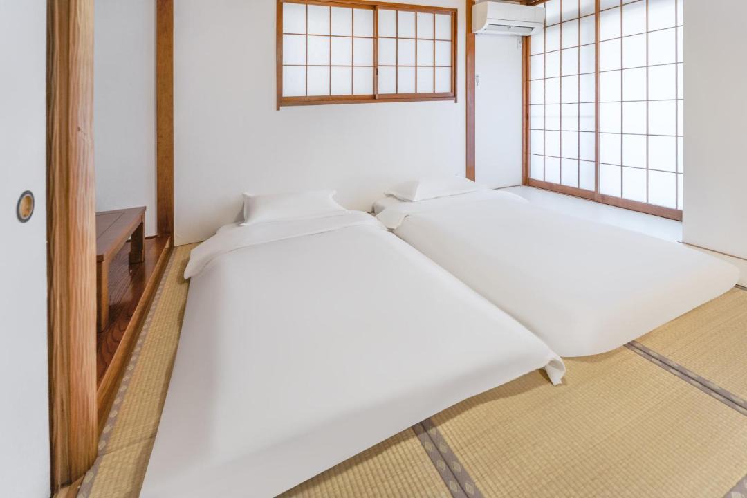 Nishikoiwa Apartment | 102Room,Free parking just a 7-minute walk from Koiwa tram stop This spacious 75-square-meter flats features two large bedrooms and can accommodate up to seven guests