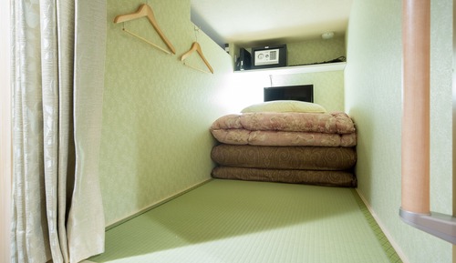 2 capsule beds at Shared Dormitory, partition can be opened/closed