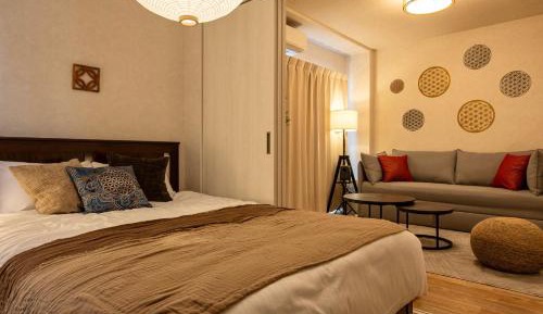 One-Bedroom Apartment with Balcony and City View