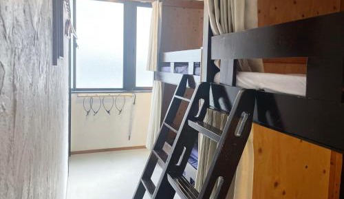 Single Bed in Female Dormitory Room